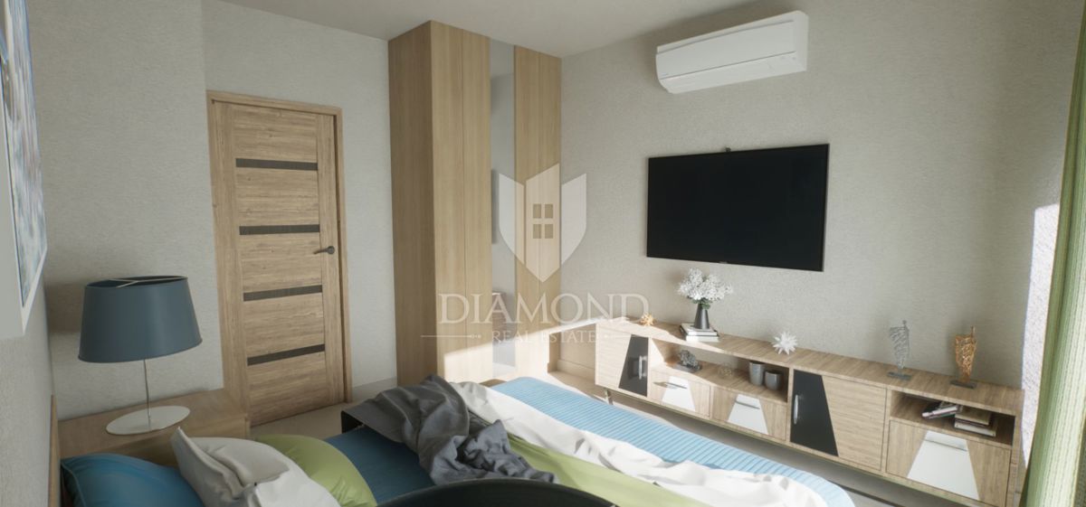 Appartamento al piano terra con giardino in una nuova costruzione vicino a Parenzo