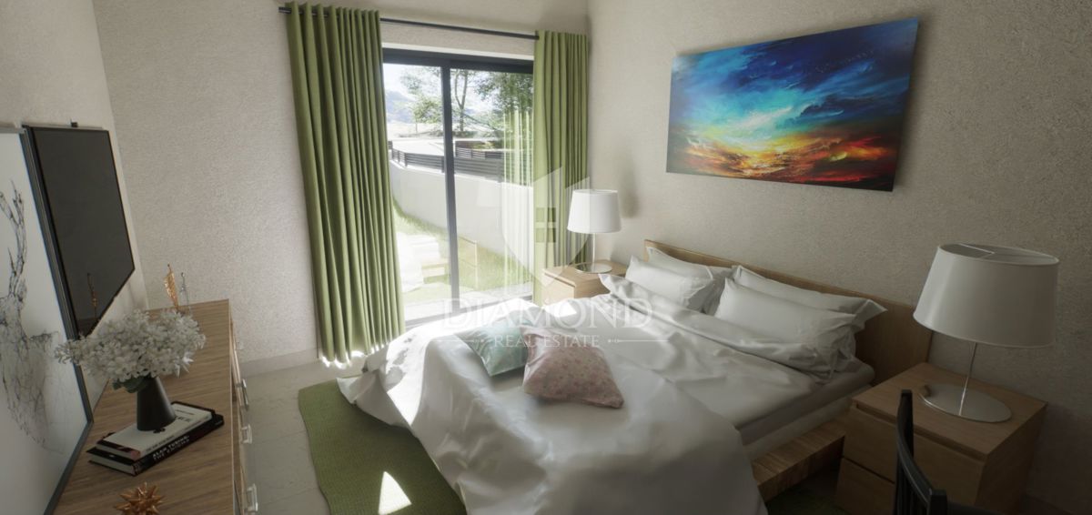 Appartamento al piano terra con giardino in una nuova costruzione vicino a Parenzo