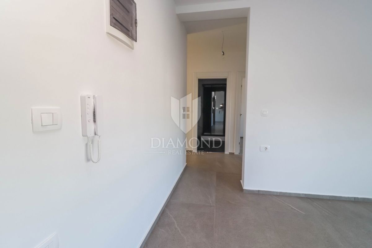 Nuovo appartamento a Medolino: 2 camere da letto, design moderno