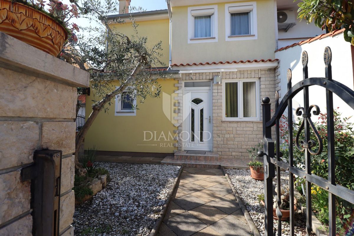 Parenzo, casa di famiglia a schiera con taverna