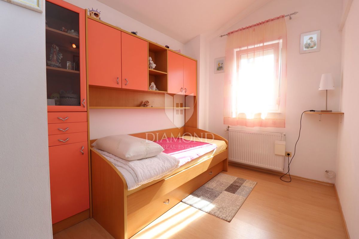 Parenzo, casa di famiglia a schiera con taverna