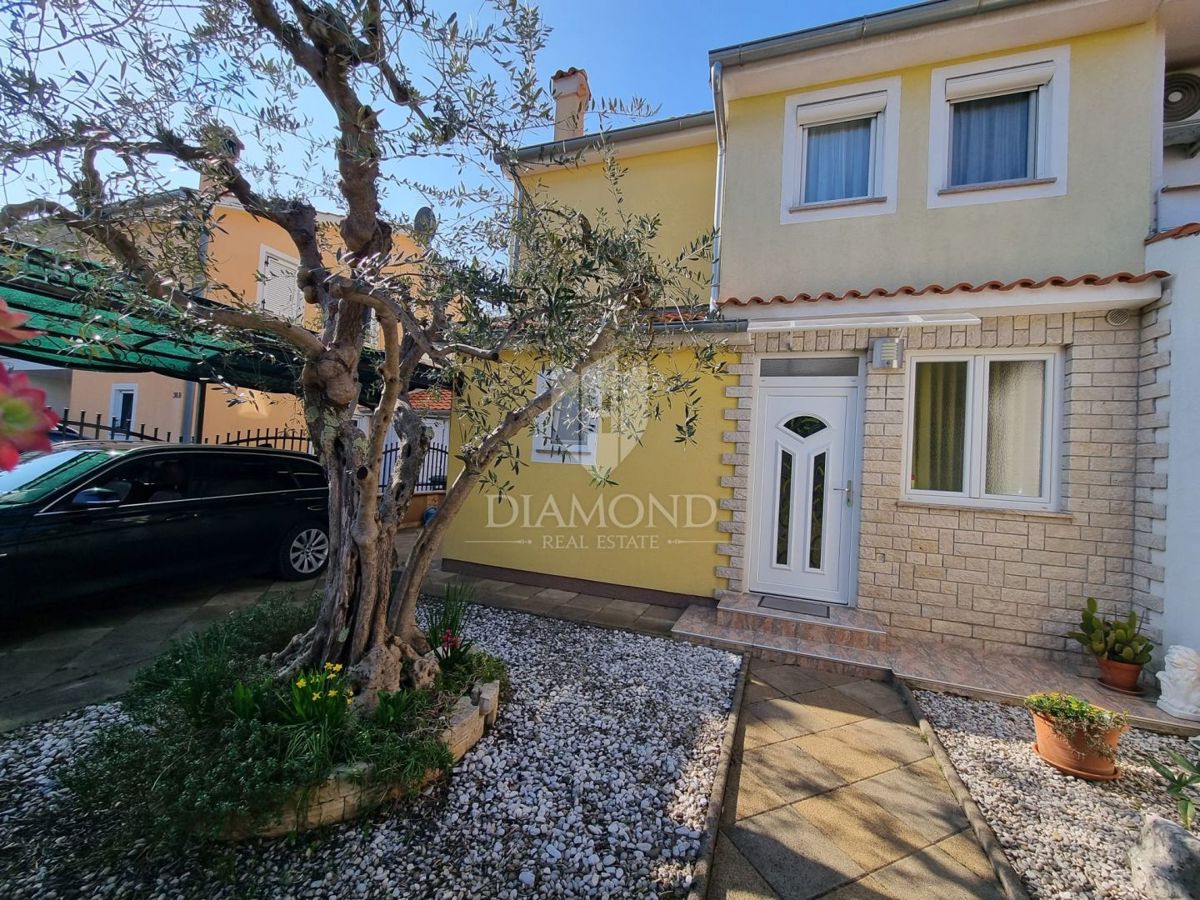 Parenzo, casa di famiglia a schiera con taverna