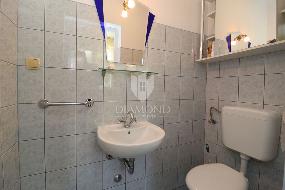 Parenzo, casa di famiglia a schiera con taverna