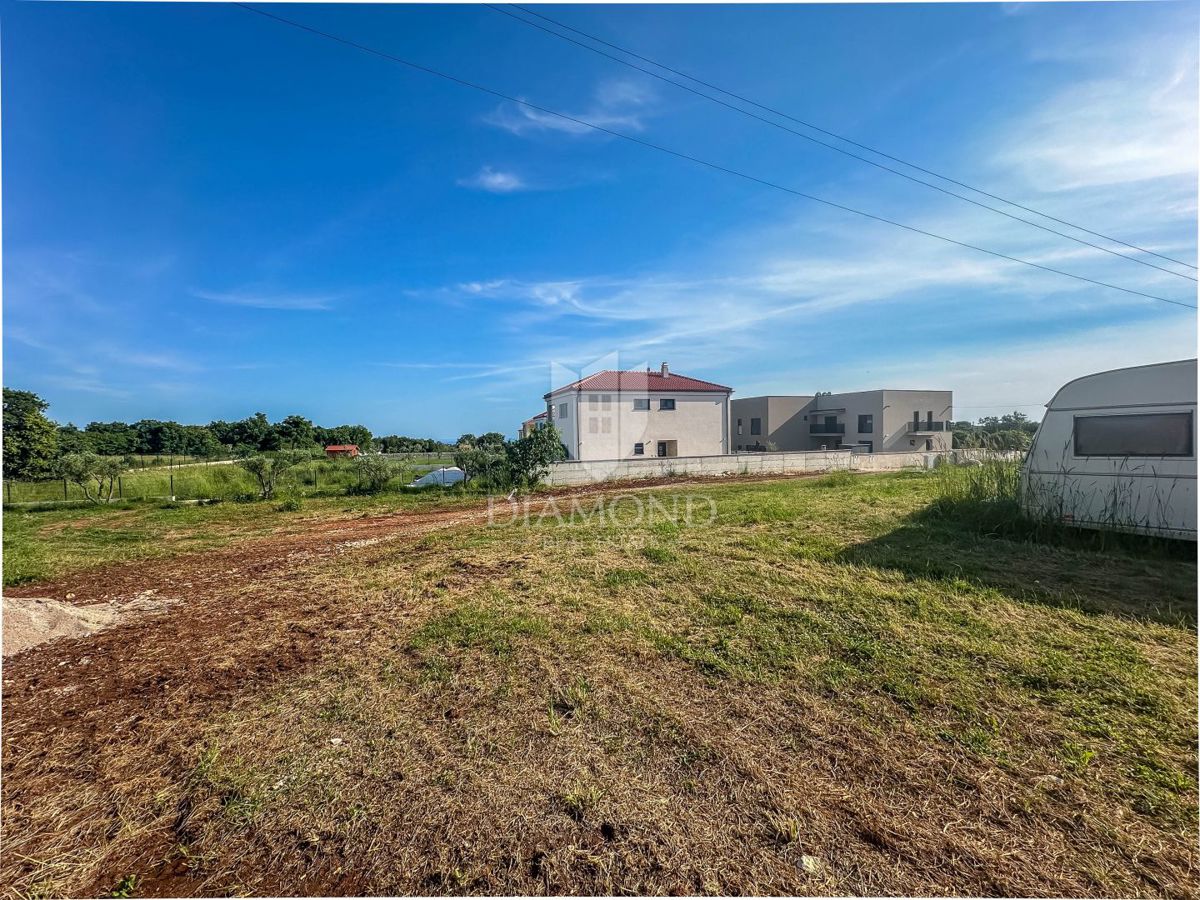 Terreno edificabile con permesso, vista mare