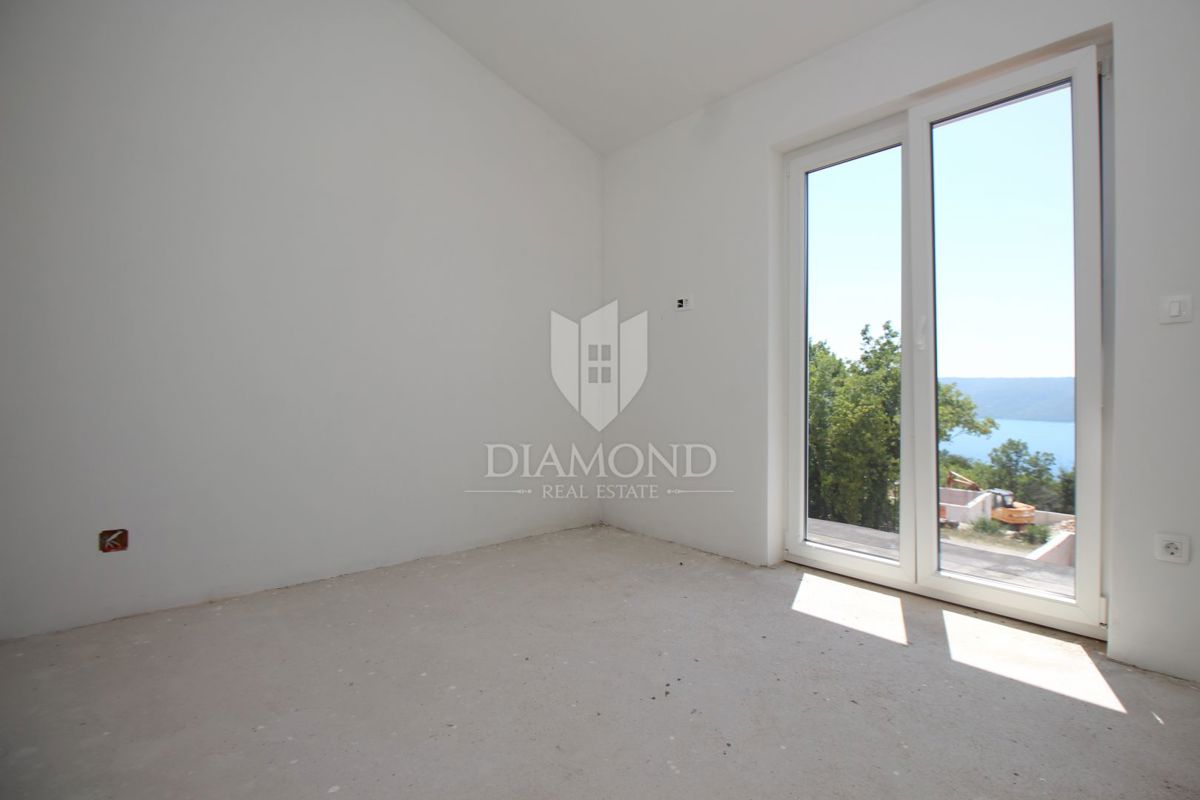 Labin, dintorni, casa in pietra con vista mare