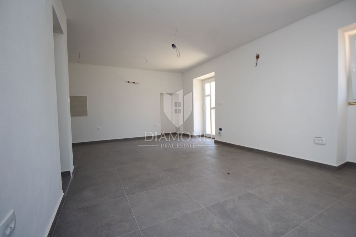 Labin, dintorni, casa in pietra con vista mare