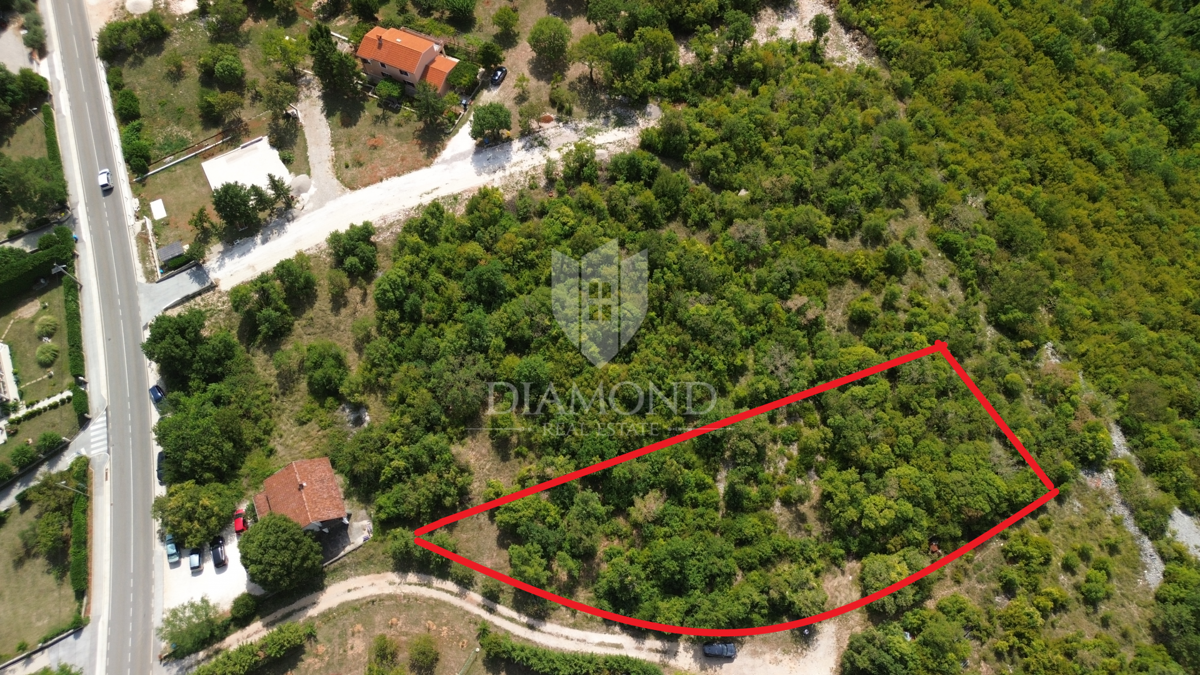 Labin, dintorni, terreno edificabile in posizione privilegiata