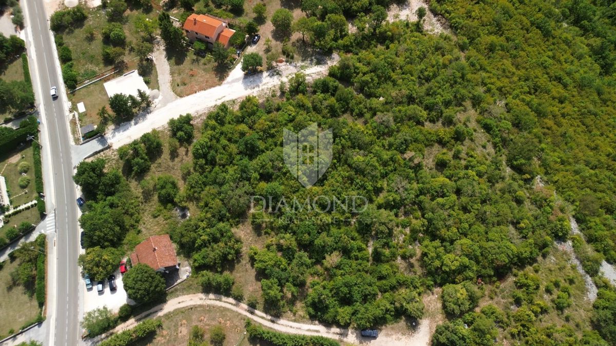 Labin, dintorni, terreno edificabile in posizione privilegiata