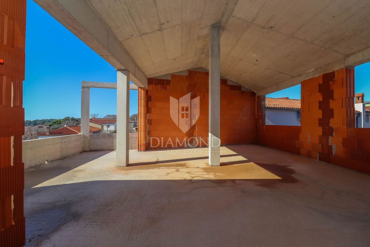 Medolino, attico con vista mozzafiato