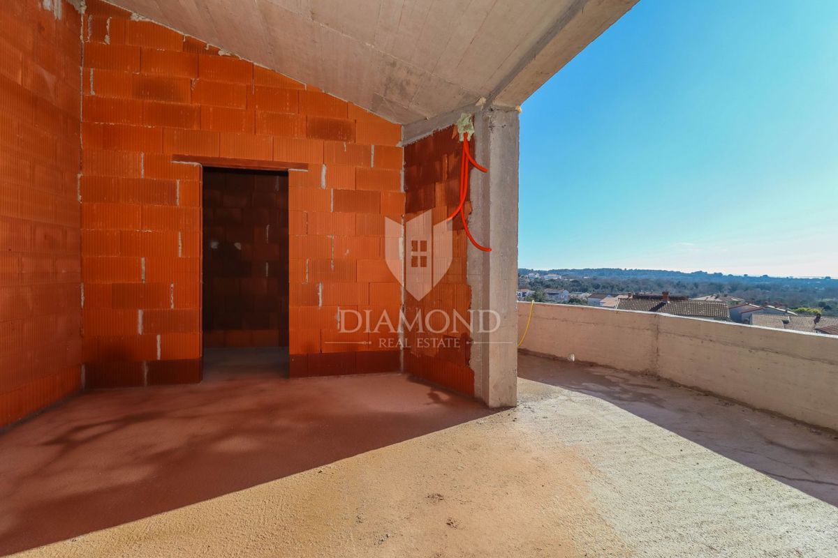 Medolino, attico con vista mozzafiato