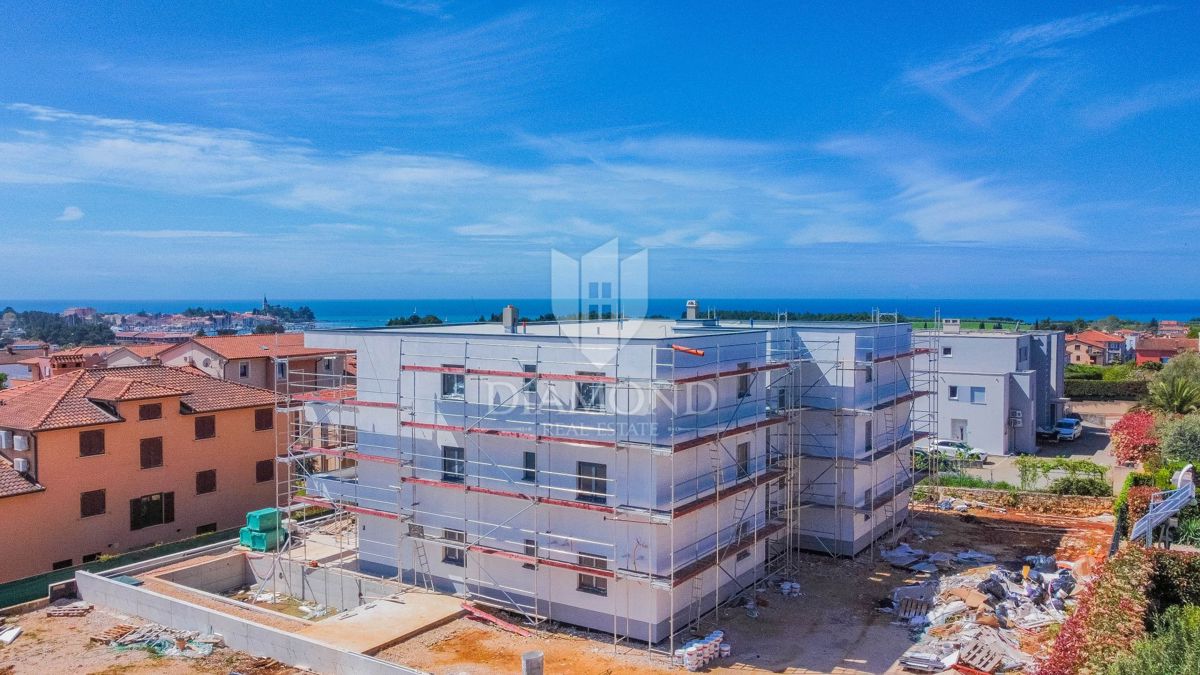 Cittanova, nuova costruzione, appartamento con piscina e 3 camere da letto!