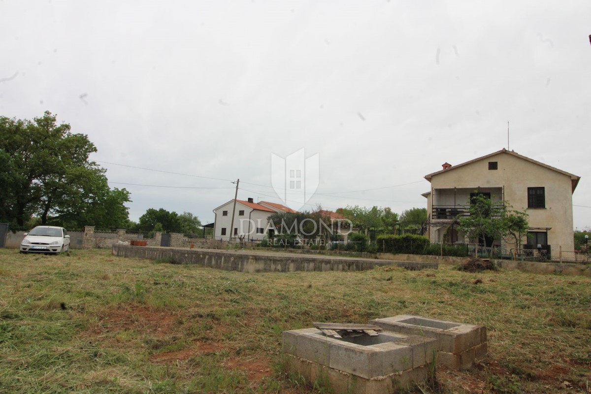 Loborika, terreno edificabile con edificio 