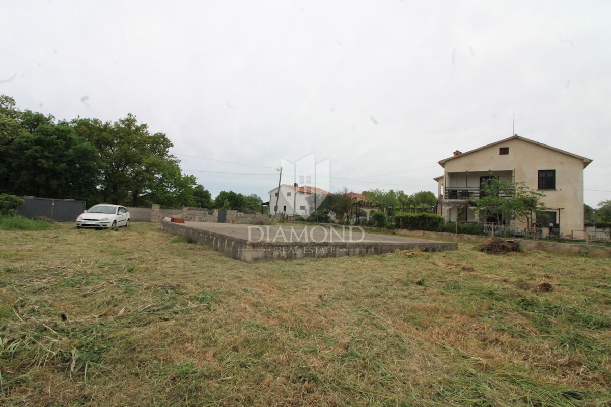 Loborika, terreno edificabile con edificio 