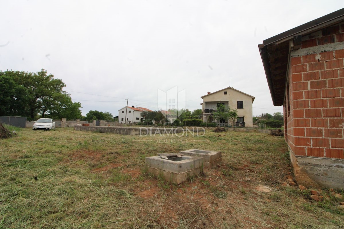 Loborika, terreno edificabile con edificio 