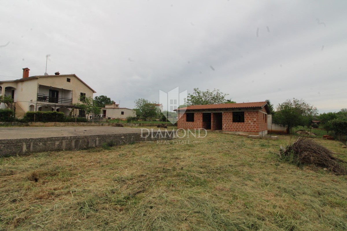 Loborika, terreno edificabile con edificio 