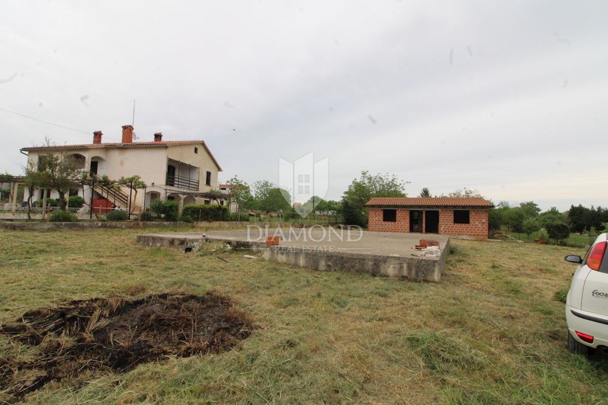 Loborika, terreno edificabile con edificio 