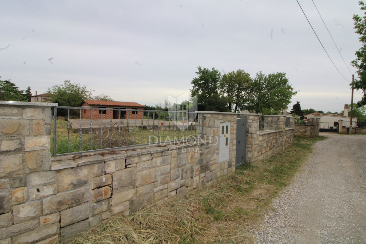 Loborika, terreno edificabile con edificio 