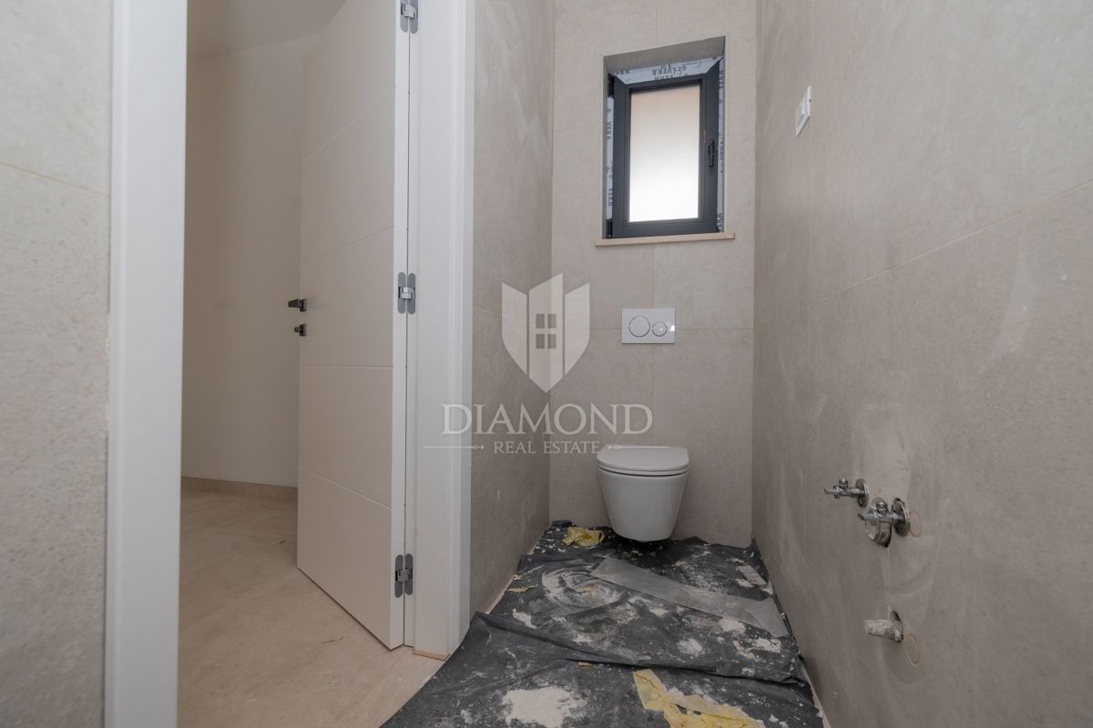 OPPORTUNITÀ! Rovigno, appartamento con giardino, vicino al mare