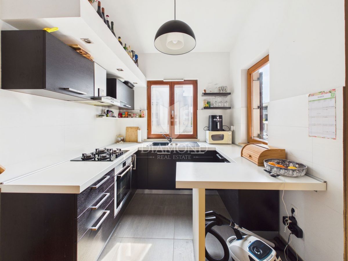 Appartamento di carattere con galleria e loggia.