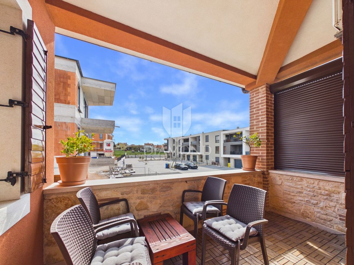 Appartamento di carattere con galleria e loggia.