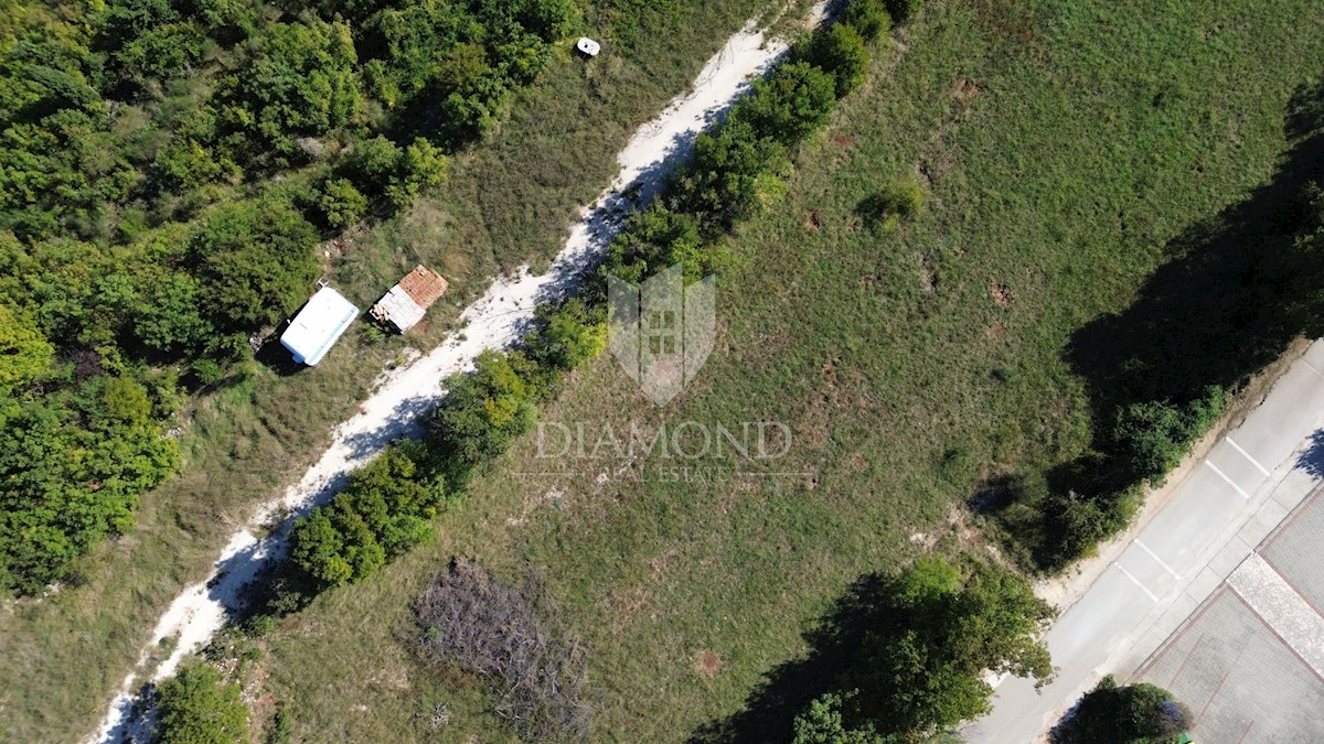 Albona, dintorni, terreno edificabile con vista mare