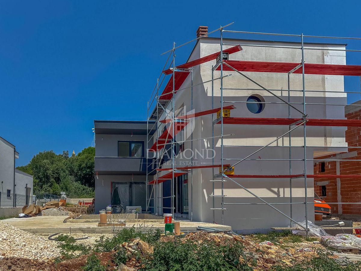 Medolino, nuova casa moderna con vista mare