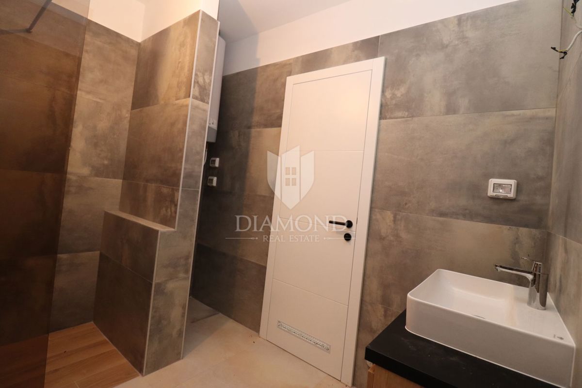 Moderno appartamento con piscina e giardino in vendita - Volme