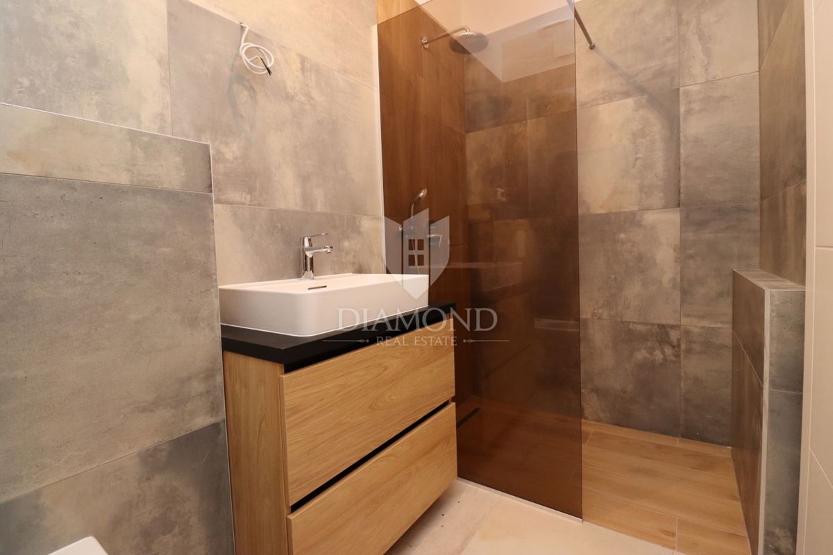 Moderno appartamento con piscina e giardino in vendita - Volme