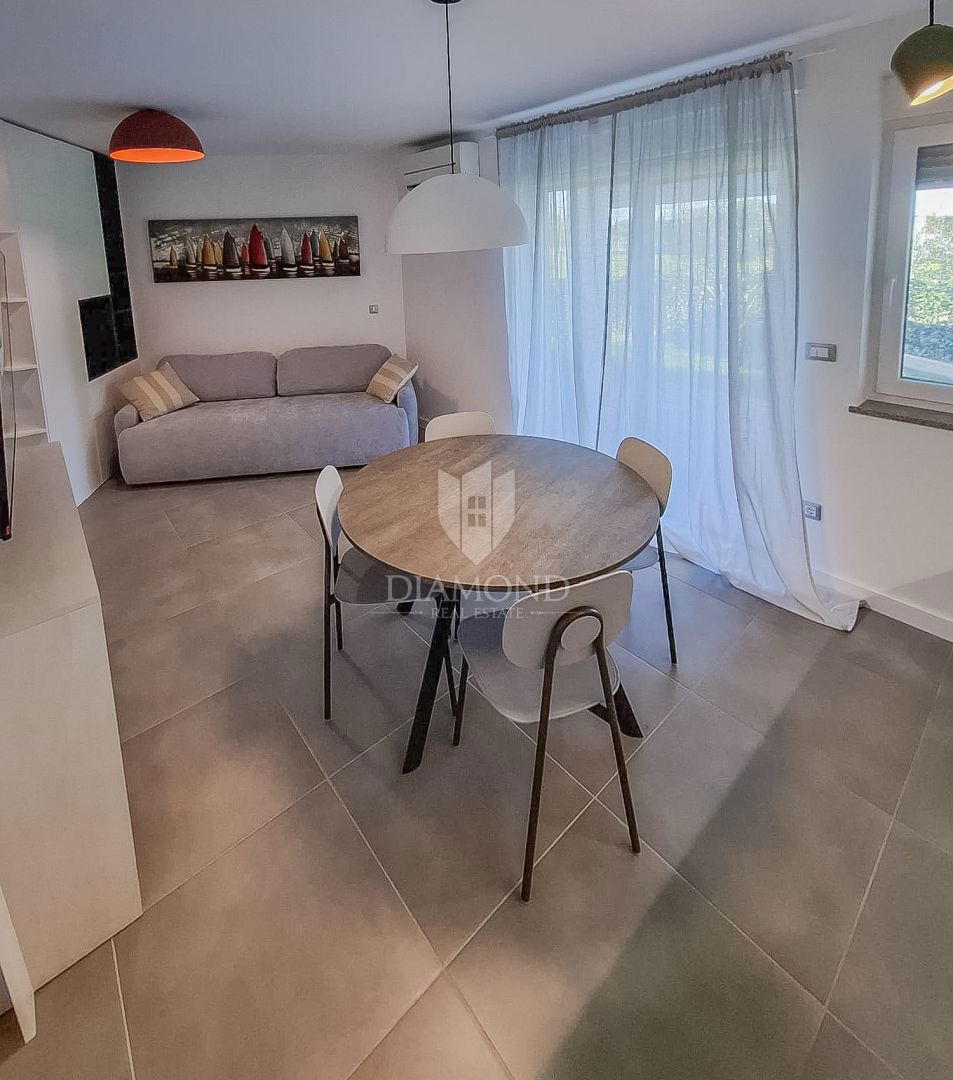 Occasione! Cittanova, appartamento al piano terra con giardino, prima fila al mare!