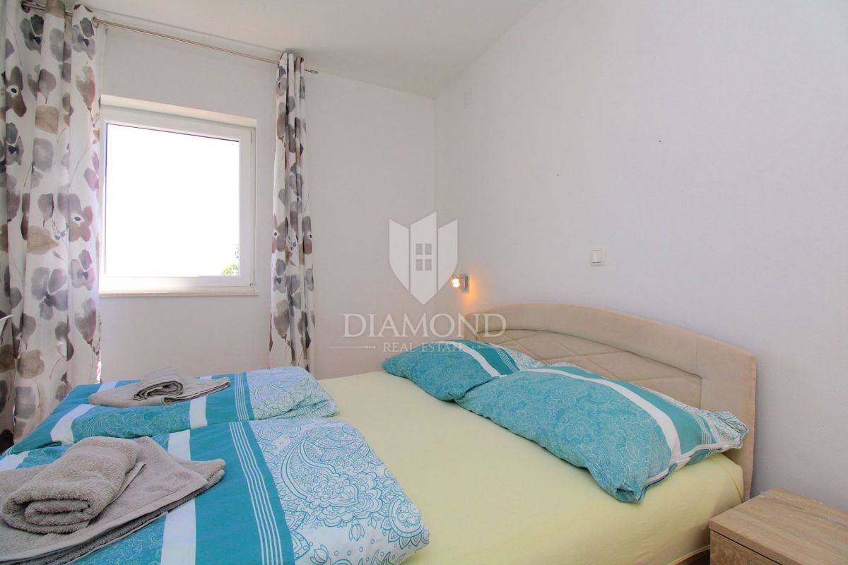 Casa con appartamenti e piscina nella zona di Rabac