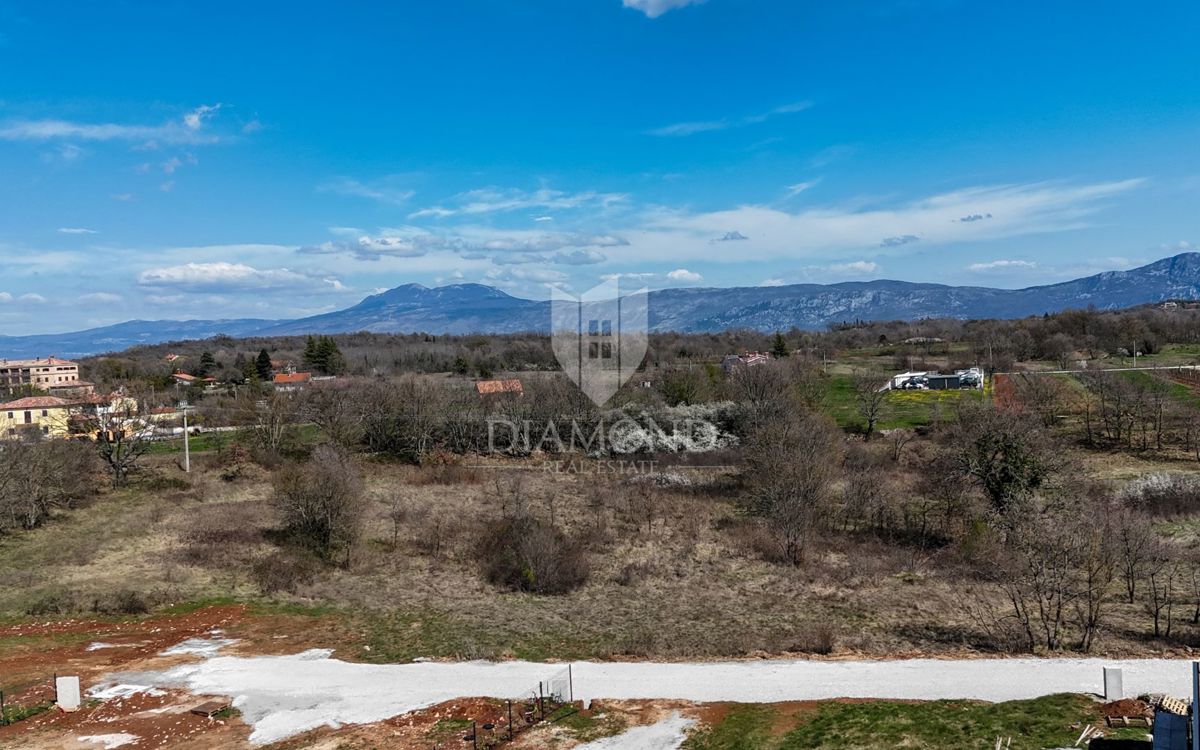 Labin, dintorni, terreno edificabile in posizione tranquilla