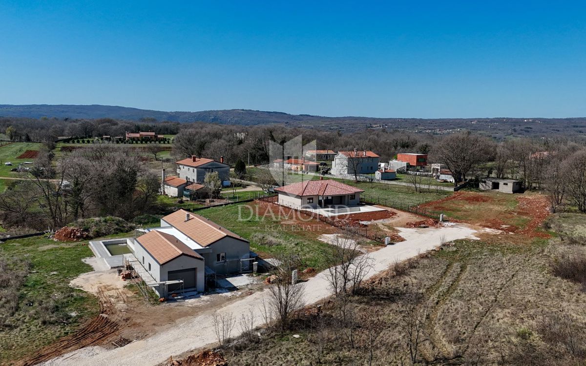 Labin, dintorni, terreno edificabile in posizione tranquilla