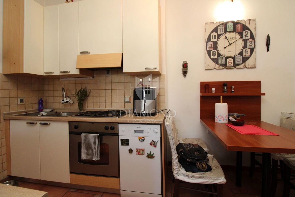 Appartamento Kozala con due camere da letto, situato al piano terra e con giardino.