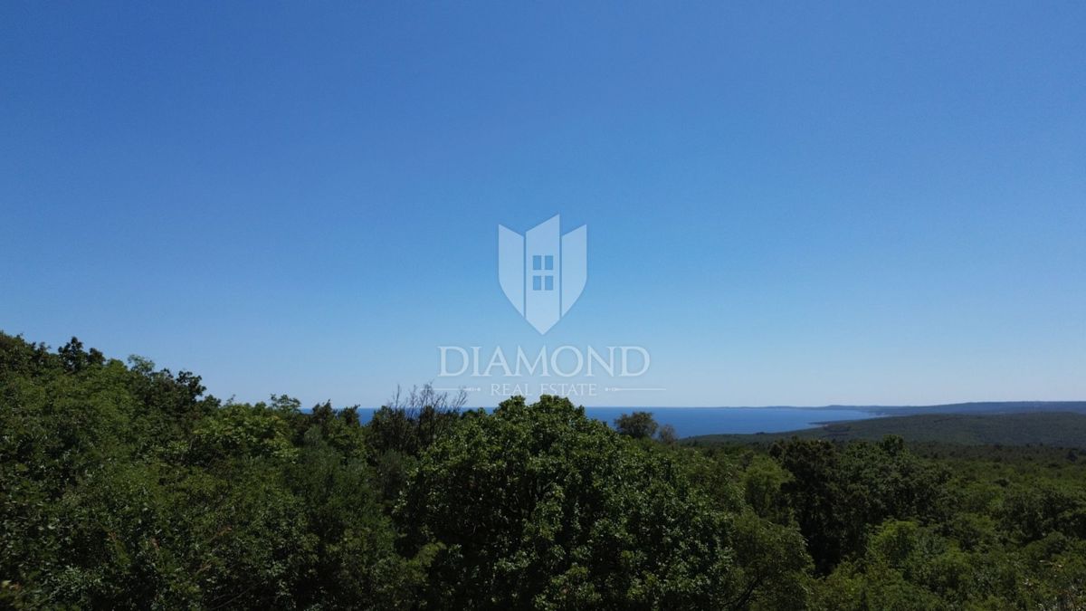 Albona, dintorni, terreno edificabile vicino al mare