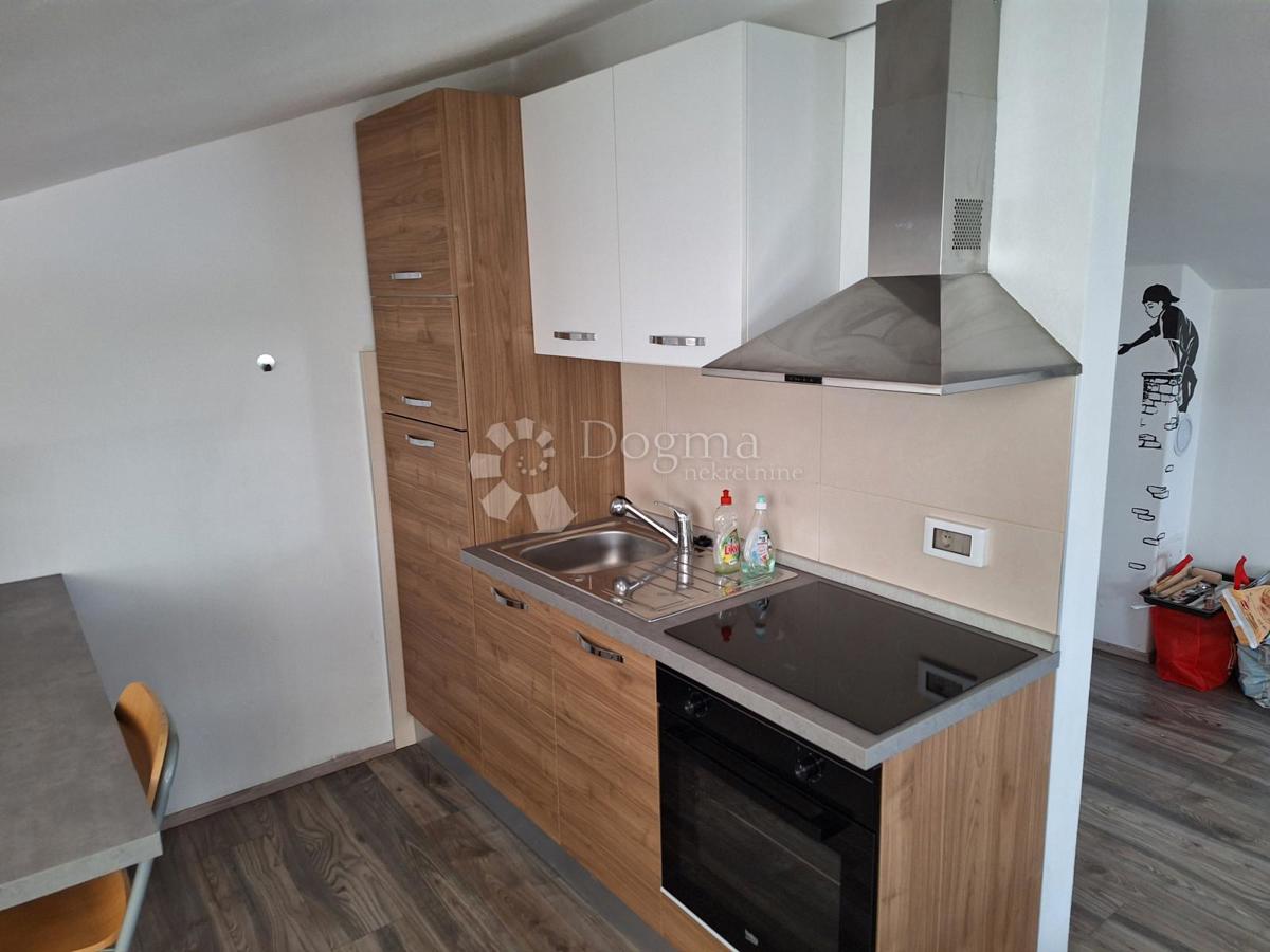 Bellissimo appartamento mansardato con vista mare