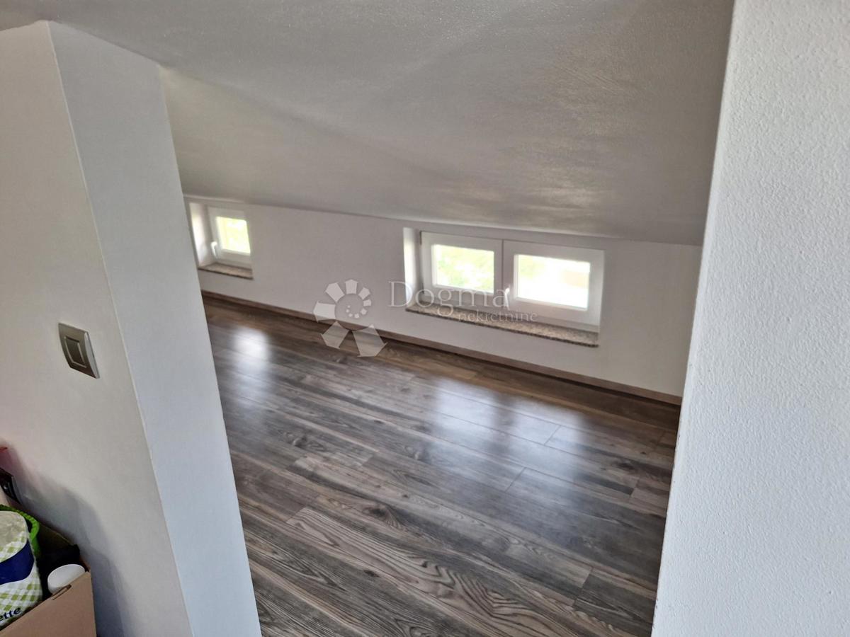 Bellissimo appartamento mansardato con vista mare