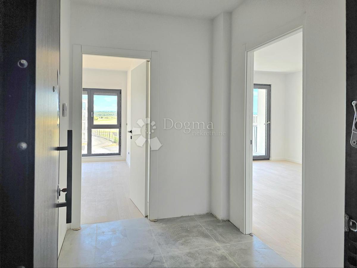 Nuovo edificio, ascensore, 1 posto auto