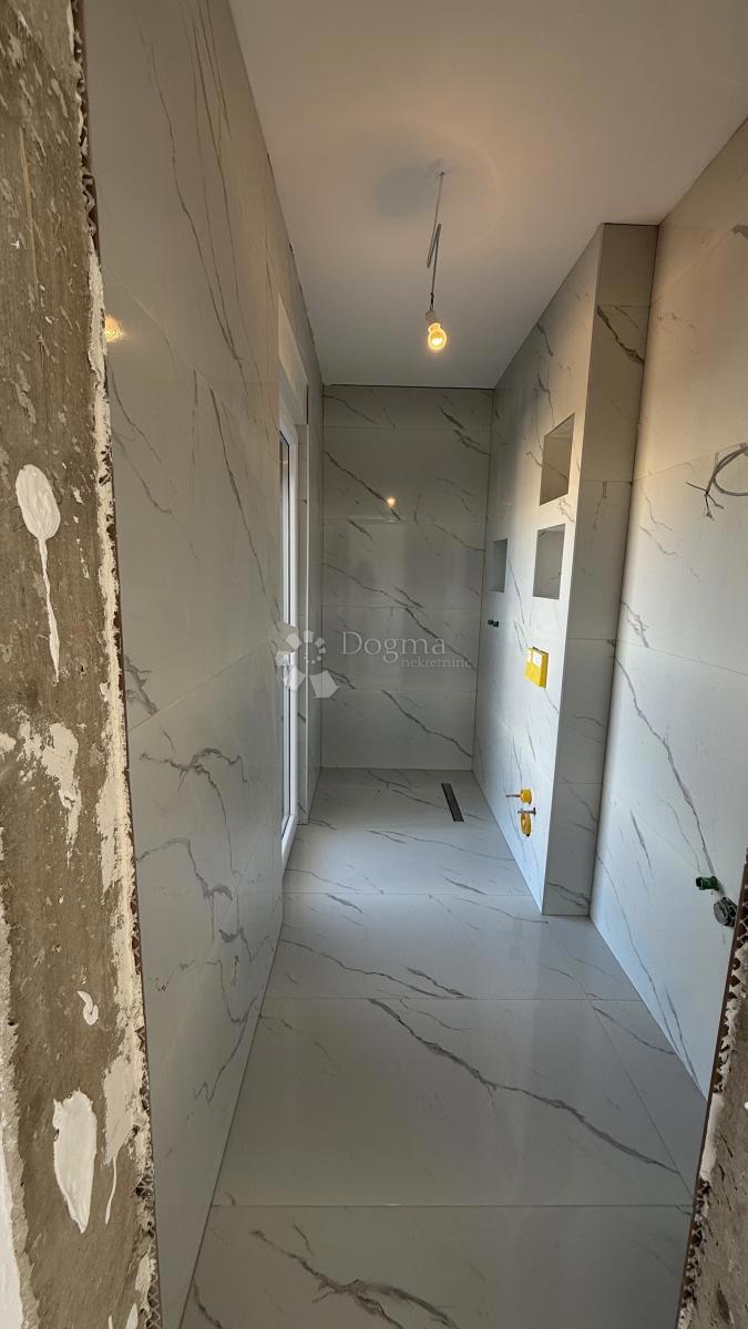 Attico con Terrazza Panoramica sul Tetto e Vista Mare