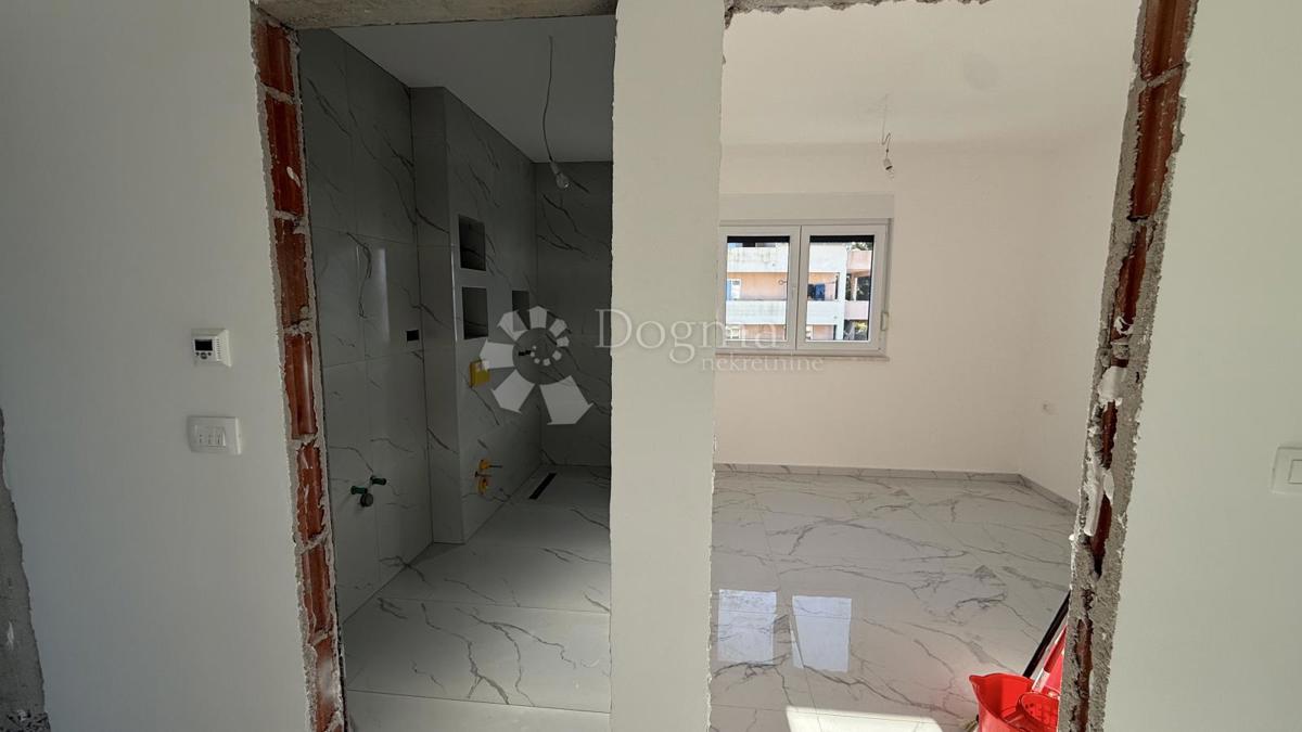 Attico con Terrazza Panoramica sul Tetto e Vista Mare