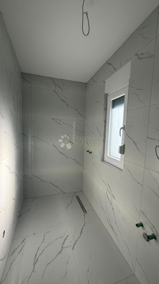 Attico con Terrazza Panoramica sul Tetto e Vista Mare