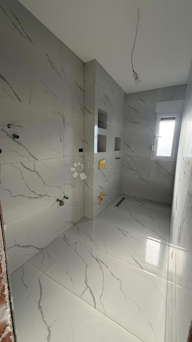 Attico con Terrazza Panoramica sul Tetto e Vista Mare