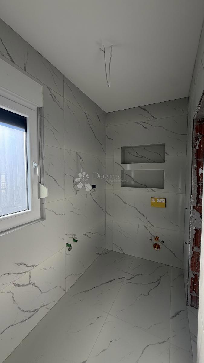 Attico con Terrazza Panoramica sul Tetto e Vista Mare