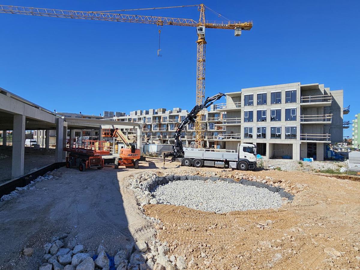 Umago, nuova costruzione, appartamento con vista e garage