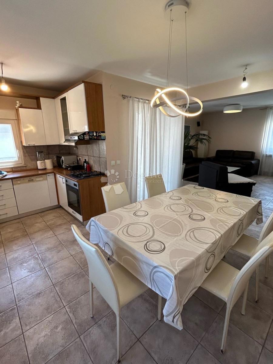 Appartamento Duplex Trilocale 114 m² con Giardino e Vista Aperta