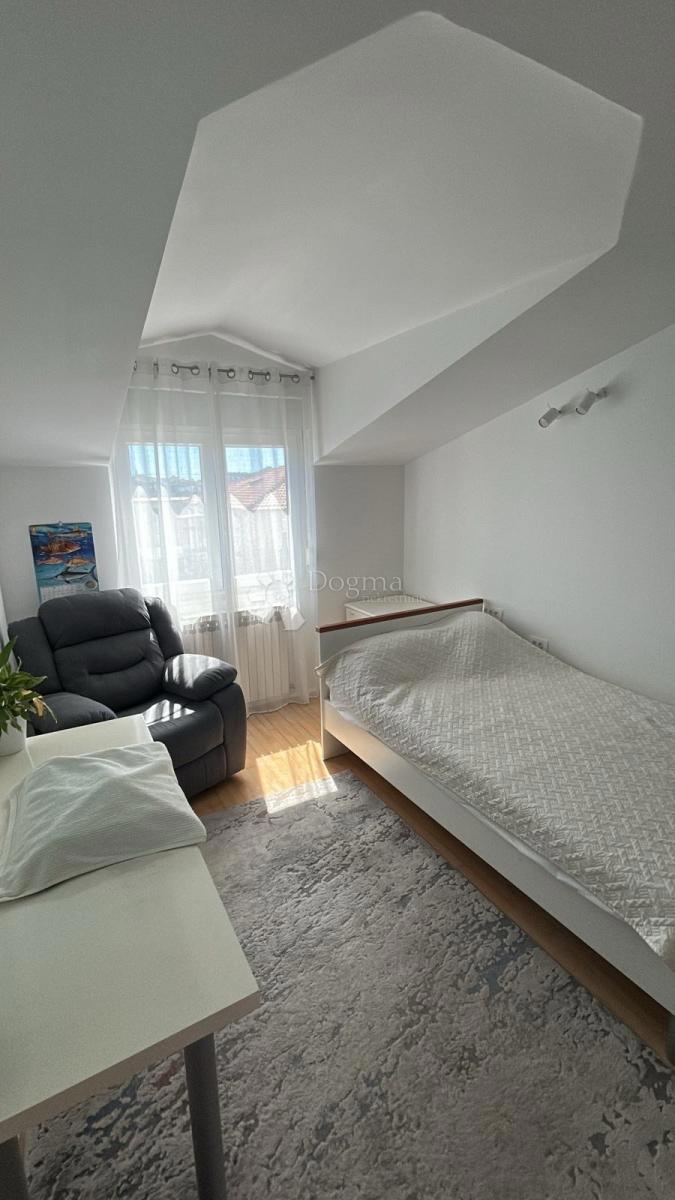 Appartamento Duplex Trilocale 114 m² con Giardino e Vista Aperta