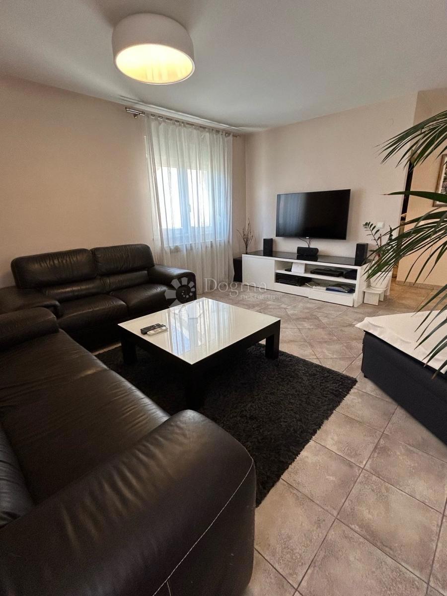 Appartamento Duplex Trilocale 114 m² con Giardino e Vista Aperta