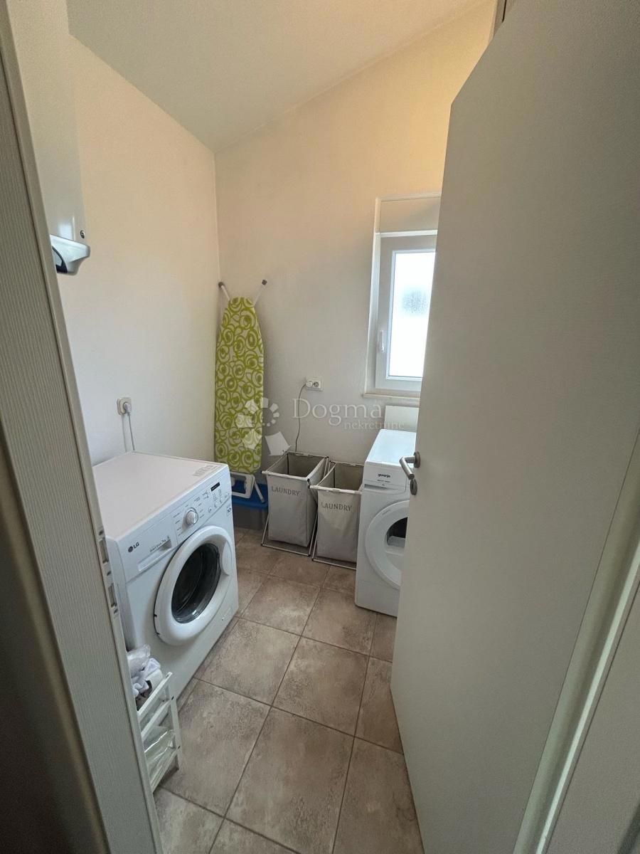 Appartamento Duplex Trilocale 114 m² con Giardino e Vista Aperta