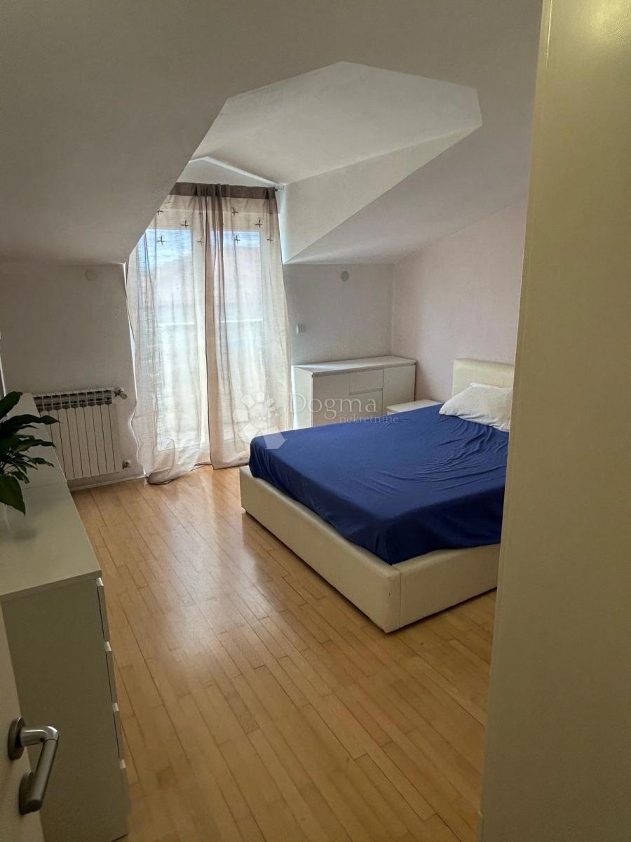 Appartamento Duplex Trilocale 114 m² con Giardino e Vista Aperta