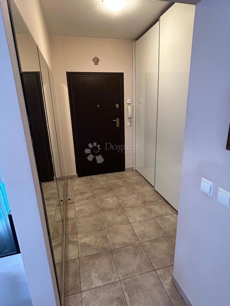 Appartamento Duplex Trilocale 114 m² con Giardino e Vista Aperta