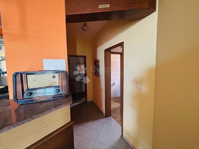CASA CON VISTA MARE E UFFICI AL PIANO TERRA